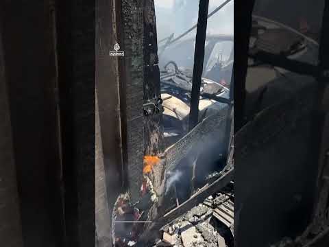 Helicopters douse flames threatening hillside homes in California