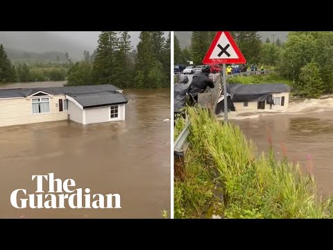 Storm Hans: moment mobile home dragged away by floodwater in Norway