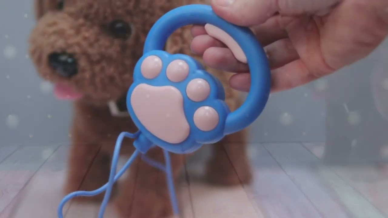 Игрушка щенок коричневый интерактивный с поводком - видео