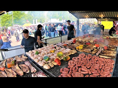 Street Food Fest in Milano, Italy. Grilled Meat, Burgers, Roasted and Pulled Pork, Pasta, Cheese