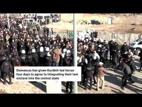 YouTube video thumbnail: Pro-Kurdish Protesters in Turkey Cross Border Wall Into Syria