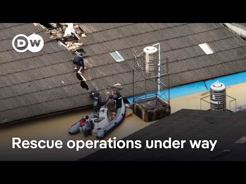 YouTube video thumbnail: Thailand and Malaysia Step up Flood Rescue Efforts