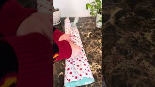 How to wrap a Christmas present step by step
