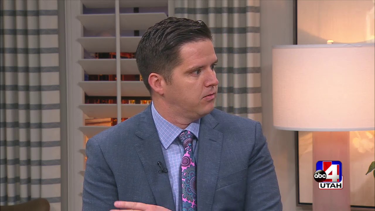 Person in a suit discussing important topics.