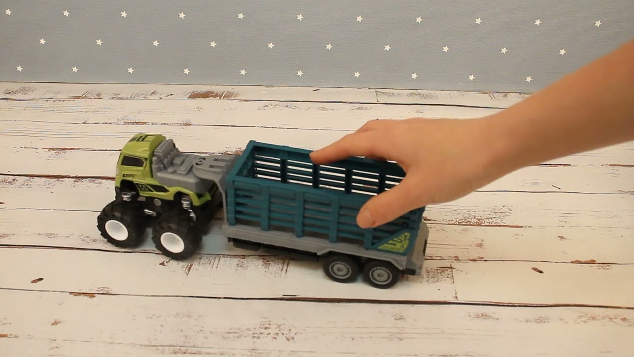 Тягач Lanson Toys со львом в прицепе инерционный металлический 1:43  - видео
