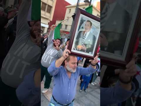 وجدة : السوريين هازين تصويرة الملك ومحتافلين بالأعلام الوطنية