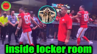 Travis Kelce high fives fans inside the locker room after the Chiefs loss to Chicago Bears