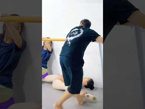 Dance students in flexibility training