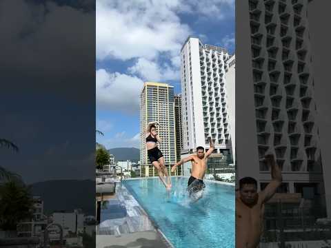 Can we spell LOVE while jumping into a pool? Pls rate our performance.