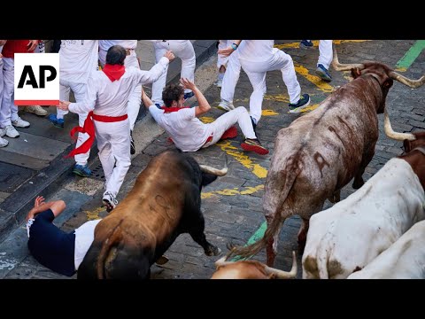 YouTube video thumbnail: Daredevils run With Charging Bulls at Famous Festival in Spain