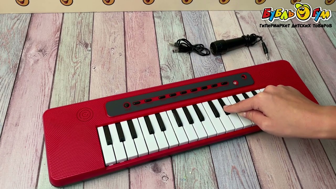 Электросинтезатор с микрофоном красный  37клавиш 47,5см с 3лет  - видео
