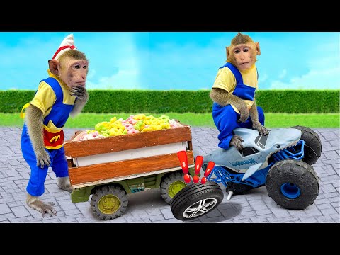 Monkey BoBo drive MONSTER TRUCK TOYS and creates giant candy and eats it with puppy at the park