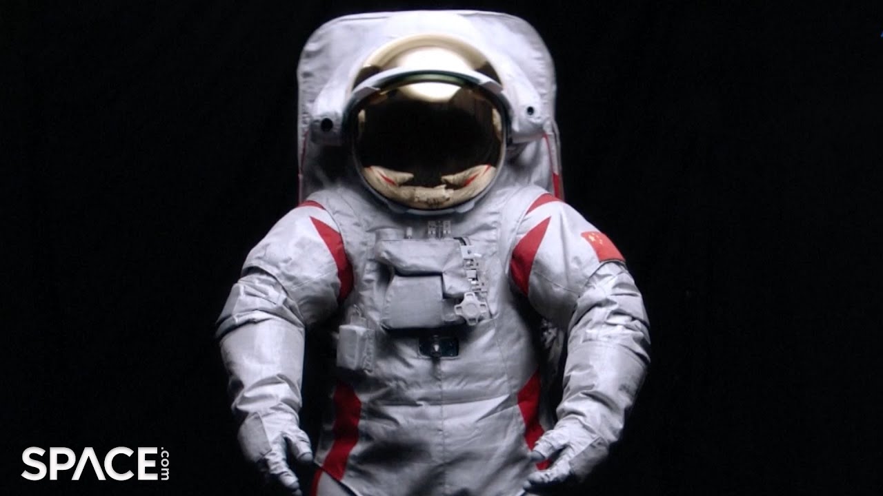 China reveals spacesuit for moonwalking at ceremony