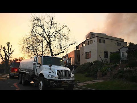 Five fires spreading as over 1,400 firefighters tackle the storm