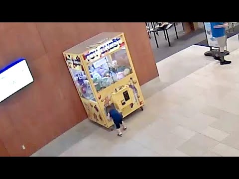 YouTube video thumbnail: Kid Climbs Into Claw Machine at Ohio Community Center