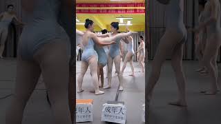 Students doing dance flexibility training