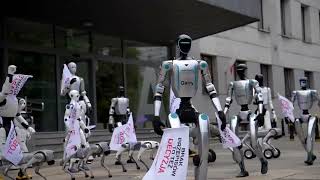 YouTube video thumbnail: Robots 'Protest' Outside Poland Ministry Demanding AI Oversight