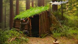 Building A Bushcraft Survival Shelter Under A Tree Root With A Bed And Wood Stove, Using Hand Tools