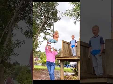Dad capturing Child zip lining video(@_thehardmans)