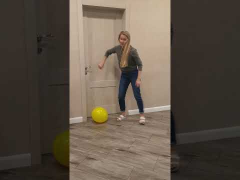Funny dogs find a yellow balloons