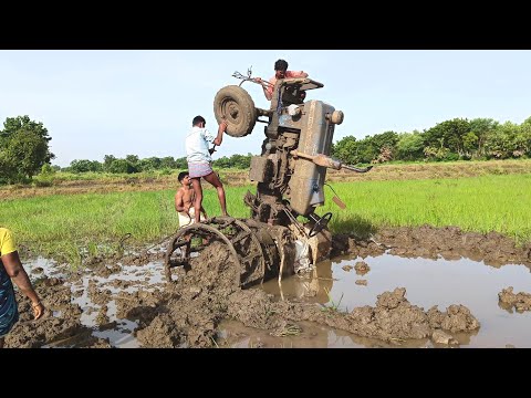 powertrac tractor stunts | powertrac stuck in mud pulling out by eicher 380 | Rajesh eslavath