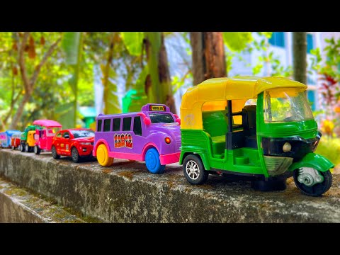 Satisfying Toy CNG Auto Rickshaw, School Bus, Sports Car, Dump Truck Hand Driving On Boundary Wall