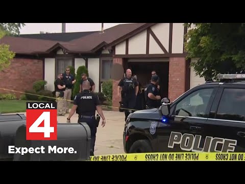 Woman finds mother, stranger dead in kitchen of Warren home, sources say