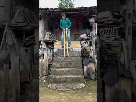 Crossing flood water with wooden sticks #shortsvideo