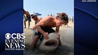 YouTube video thumbnail: Some Fishers Lure Sharks Into Shallow Waters, Causing Concern in New Jersey