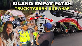 Silang Empat Patah, Truck Mundur Nabrak Bus Dan Jatuh Ke Bekoan