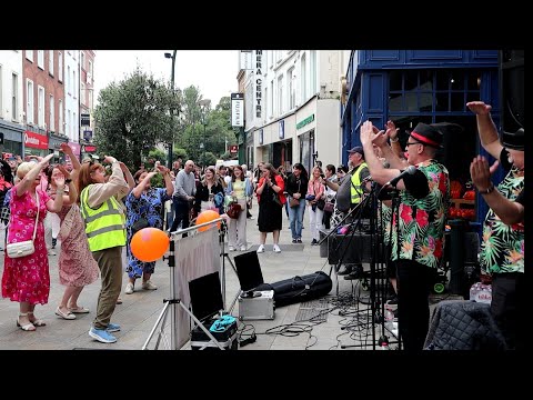 This Turns Into A Great Session on Grafton Street with "CharityOke" Singing For a Worthy Cause.