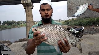 Parag Fish Catching on Bridge