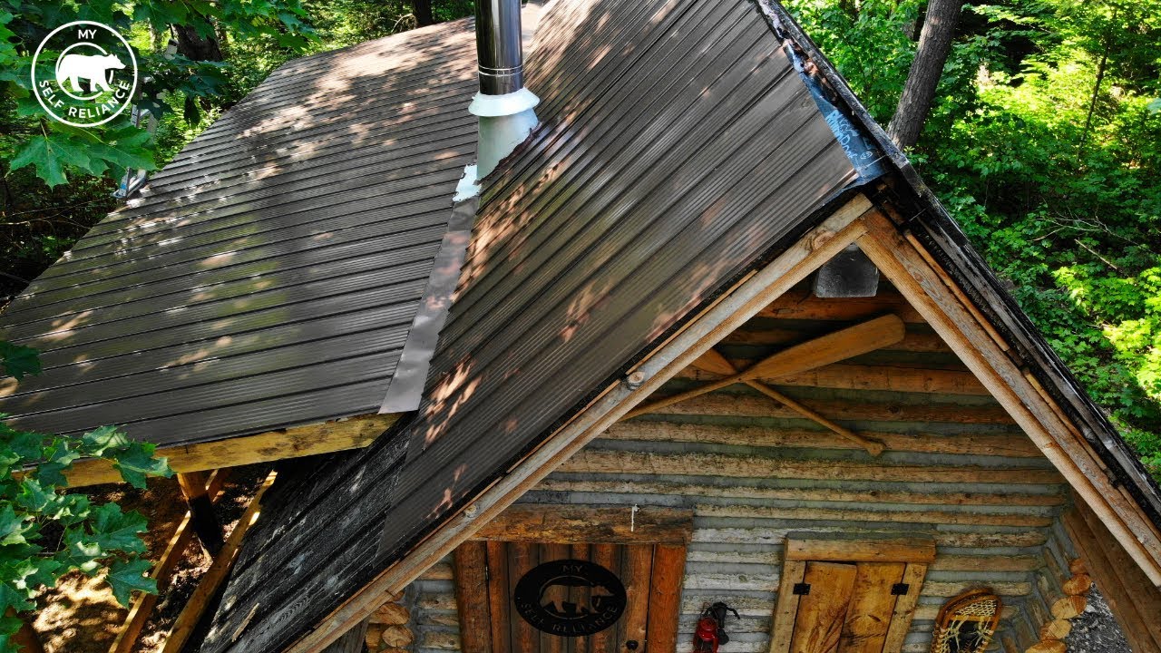 Installing a Metal Roof on an Off Grid Log Cabin Alone Alaska Update