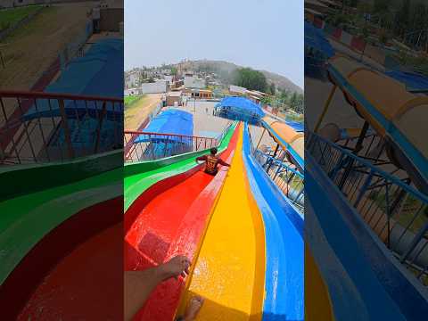 POV enjoying longest waterslide in waterpark