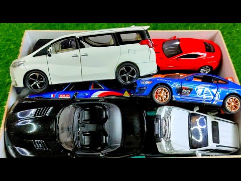 Very full Cars in the Box, Ferrari, Mazda, Pagani, Supra, 570, Rolls-Royce, Defender, Camaro.