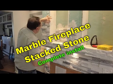 Stacked stone Fireplace. Entire install