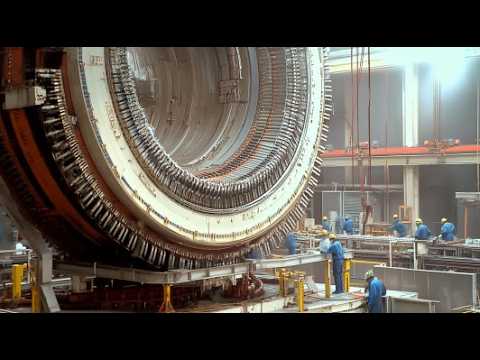 Giant Electrical Generator Rebuilding Process. Production Processes & Heavy CNC Machines In Working