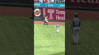 Phillies Mascot Flips Cam Caminiti a hotdog on his way to warm up for the #MLB Futures Game! 😂🌭