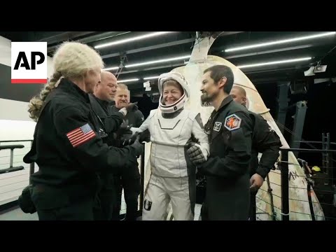 YouTube video thumbnail: Spacex Capsule Returns to Earth With Four Crew Members