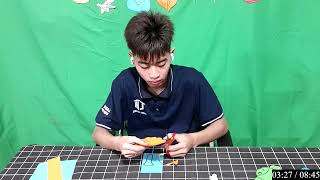 Cắt dán mô hình tiệm bánh nhỏ bằng giấy thủ công với tủ bánh, tivi và các loại bánh kẹo