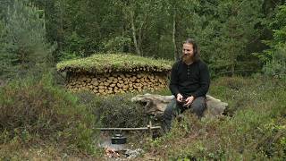 Making round firewood stack - holz hausen