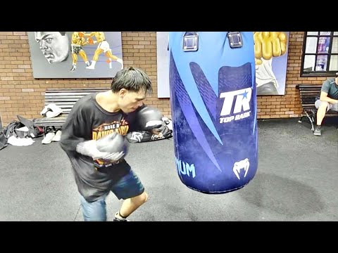 World Champ Angelo Leo tears up heavy bag