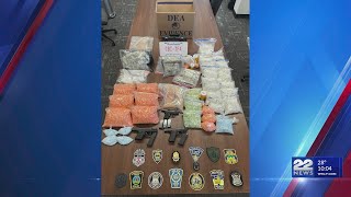 Tens of thousands of counterfeit pills, meth and guns seized; Two men arrested