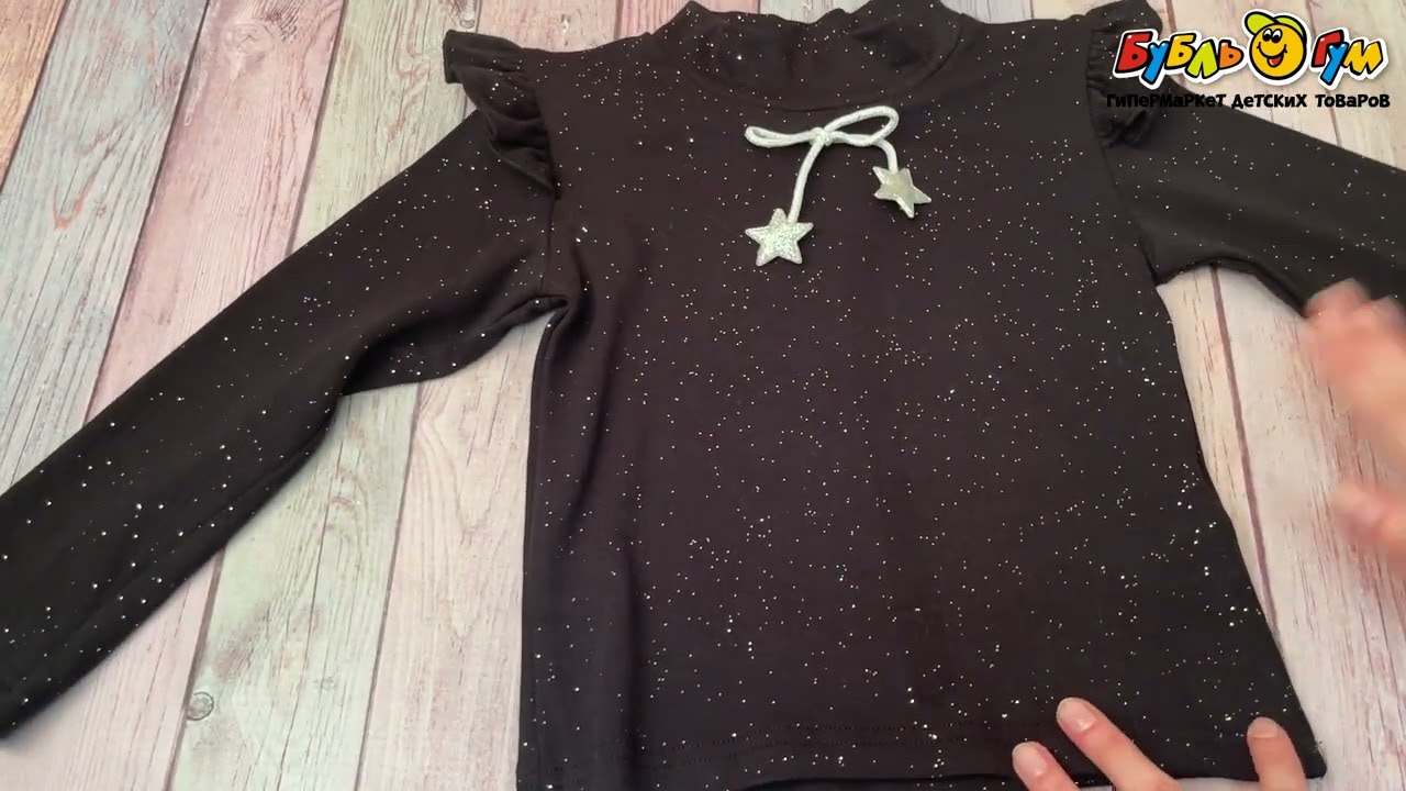 Водолазка Lanson Kids с рюшами на рукавах и декором бантик черная - видео