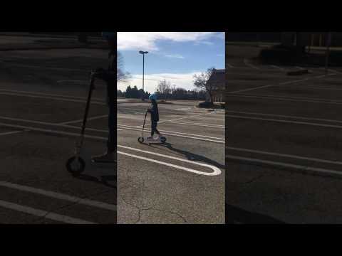 Test riding the RND R1 electric scooter.