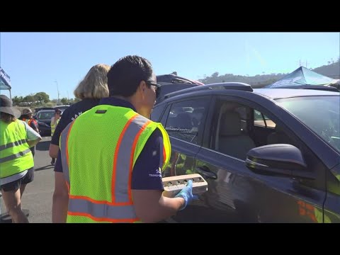 YouTube video thumbnail: Thousands Gather at Emergency Food Distribution at Snapdragon Stadium