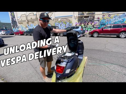 Unloading a Vespa Delivery