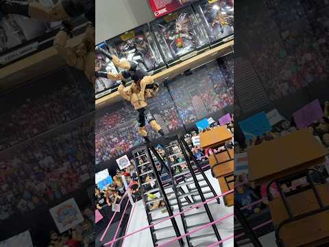 BROCK LESNAR F5’s BIG SHOW OFF A LADDER THROUGH TABLE TOWER!💥