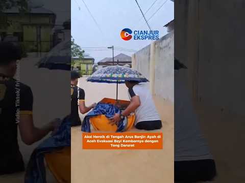 Aksi Heroik di Tengah Arus Banjir: Ayah di Aceh Evakuasi Bayi Kembarnya dengan Tong Darurat