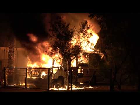 Vehicle fire in neighbors front yard